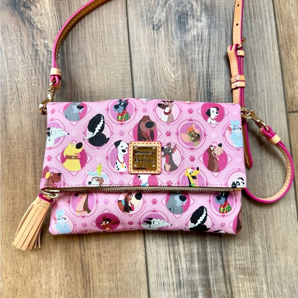 Dooney & Bourke Handbags - Dooney & Bourke Pink Dog Motif Crossbody with Tassel